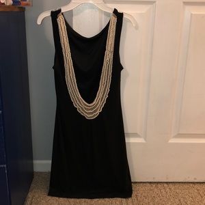 Open-Back black dress with Pearl Detailing